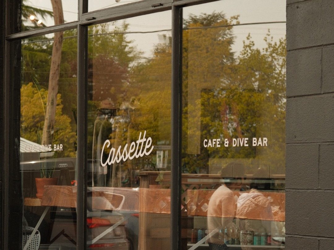 The Cassette script painted on the front window